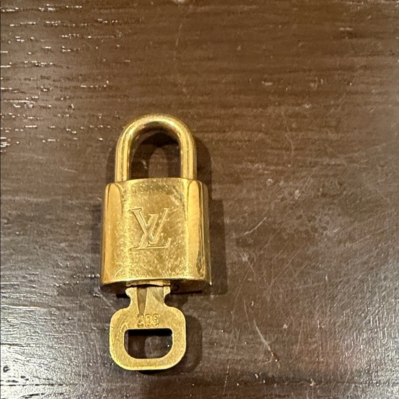 Louis Vuitton Accessories - Beautiful Authentic Louis Vuitton Lock and Key Set